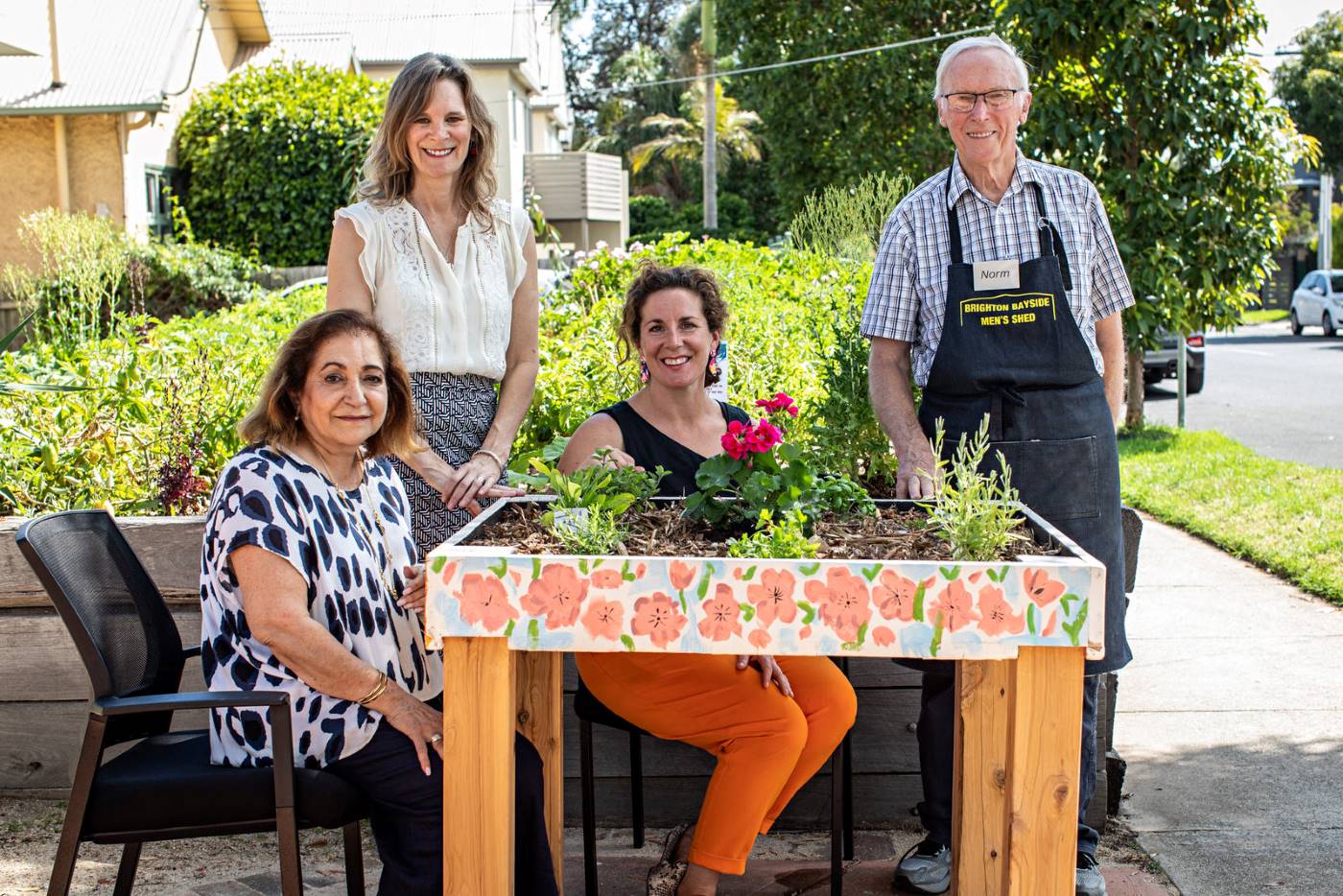 Group of volunteers surrounding a table