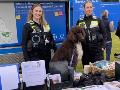 Local laws officers with dog at pop up stand at Bayside Farmers Market